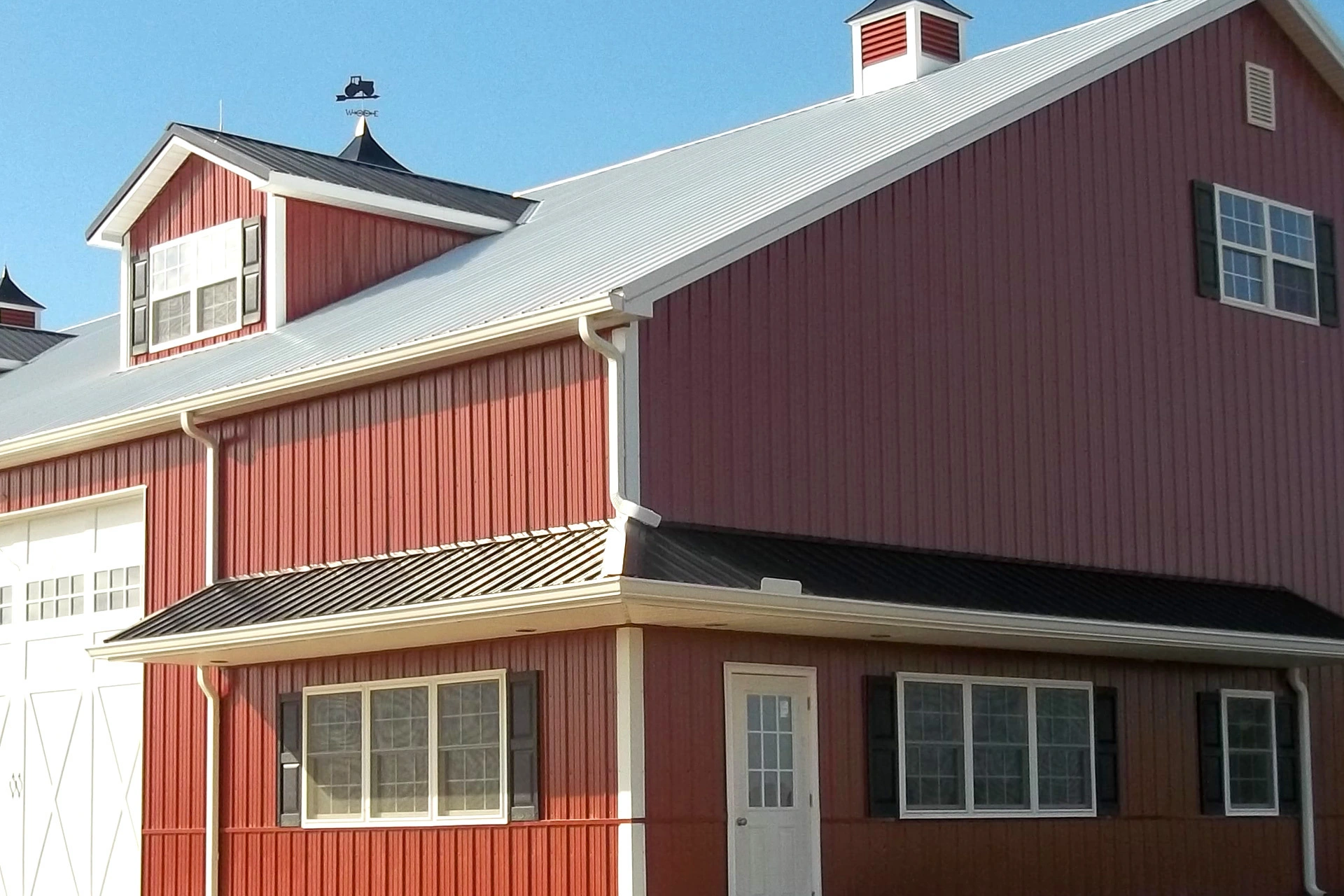 Red pole building with durable steel roofing