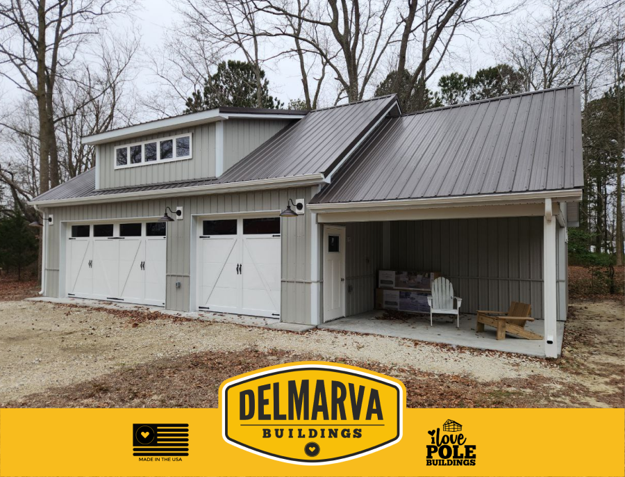 Gray pole barn garage with metal roof and double doors by Delmarva Buildings.